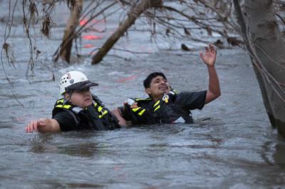 Chico Firefighter rescuing someone