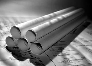 Photo of rolled up building plans