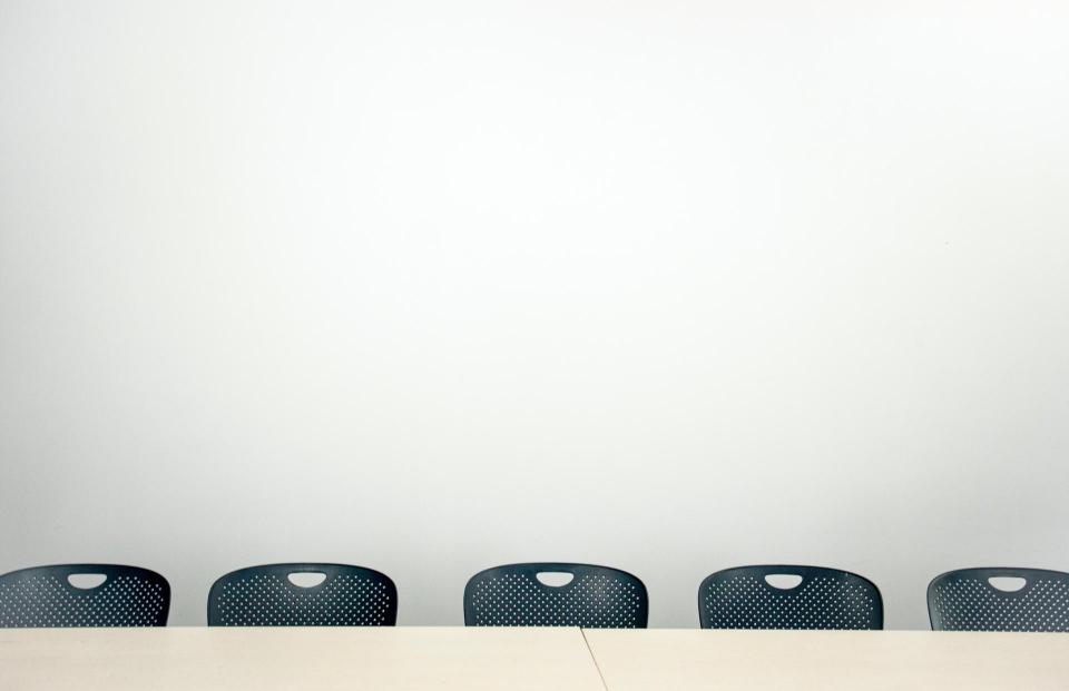 5 empty chairs